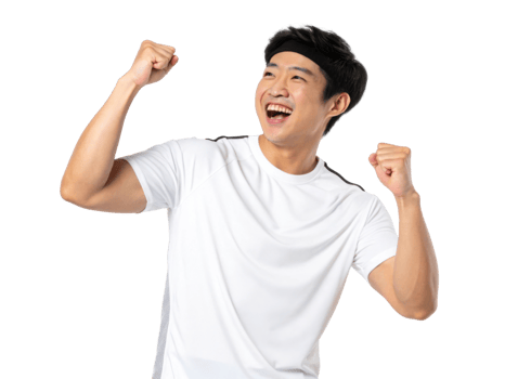 Happy man celebrating victory with raised fists, wearing white shirt png