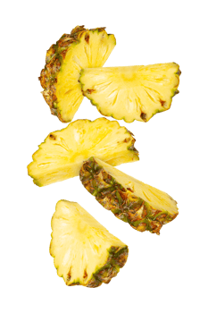 Fresh pineapple slices arranged beautifully, showcasing vibrant yellow color and textured edges, perfect for tropical dishes png