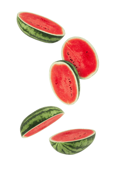 Fresh watermelon slices floating in air, showcasing vibrant red flesh and green rind png