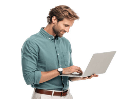 man using laptop, smiling, wearing green shirt and beige pants png