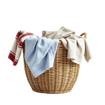 A basket with towels and a red and white towel png