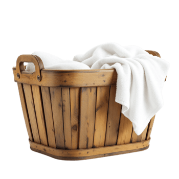 A wooden laundry basket with white towels png