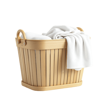 A basket with white towels inside png