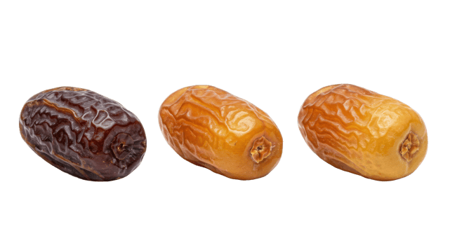 Three Rich caramel dates with textured skin great for ramadan recipes on transparent backdrop png