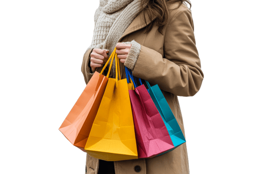 Woman holding colorful shopping bags during winter png