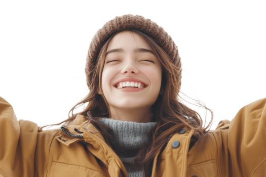 Smiling young woman enjoying winter outdoors with joy png