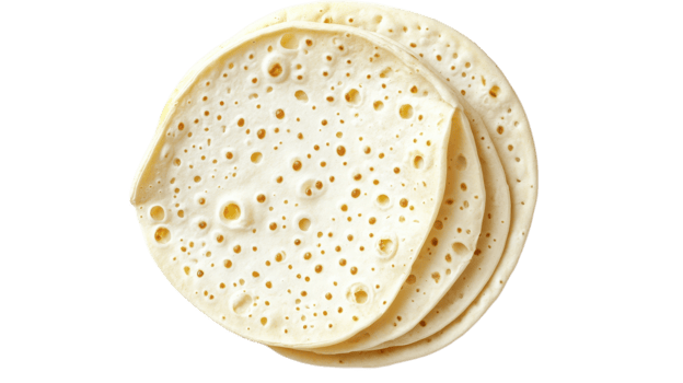 Traditional Laffa bread stacked on a plain background highlighting texture and preparation style in Middle Eastern cuisine png