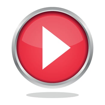 A red play button with a white arrow vector