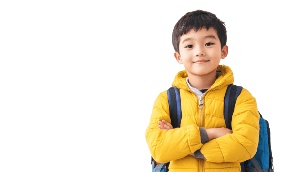 Young boy with a backpack smiling confidently in a bright yellow jacket png