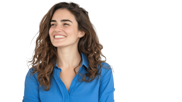 Young woman with curly hair smiles confidently while wearing a blue shirt in a bright setting png