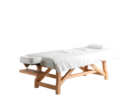 Wooden massage table with white towel png