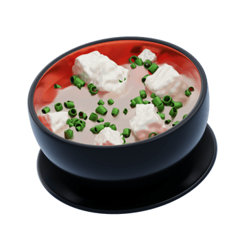 A bowl of soup with green onions in it png