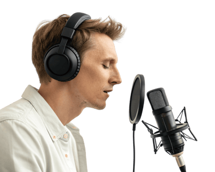 man singing into microphone while wearing headphones, focused on his performance png