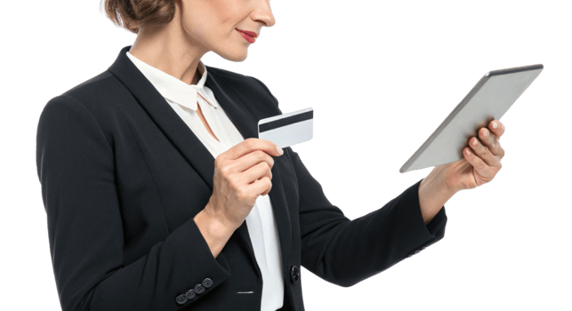 Professional woman using tablet and holding credit card png