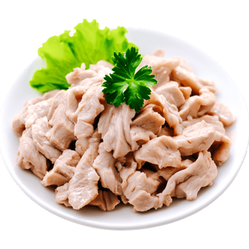 Freshly Sliced Chicken Breast with Green Leaf Garnish on White Plate png