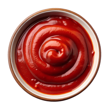 Overhead View of a Bowl of Swirled Tomato Ketchup isolated on transparent background png