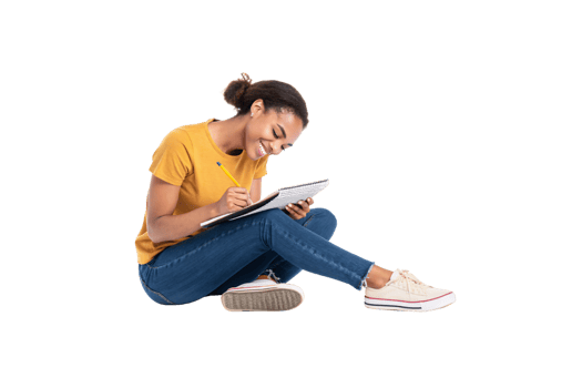 A bright and cheerful student, sitting cross-legged in a yellow top and jeans, leans forward while diligently taking notes in her notebook png