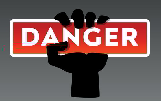 Danger warning sign with hand holding board vector