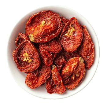Dried tomatoes arranged in a white bowl on a clean surface for culinary use, dried tomato in plateisolated on Transparent background png