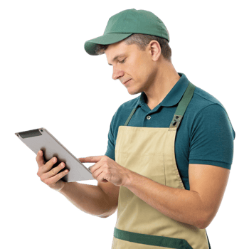 Young male worker using tablet in food service setting, showcasing technology in food management png