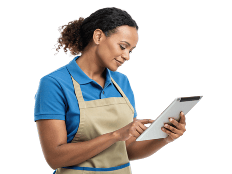 woman in blue shirt and apron uses tablet, showcasing intersection of food and technology in modern setting png