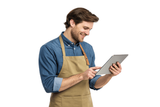 Smiling man in apron using tablet, showcasing food, technology in modern kitchen setting png