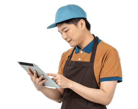 young worker using tablet in cafe, showcasing food, technology, and customer service skills png