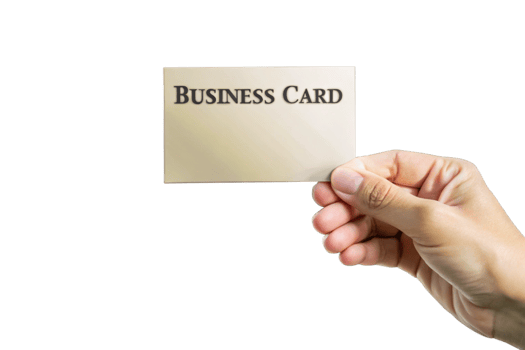 A hand holding a blank business card against a black background a closeup shot png