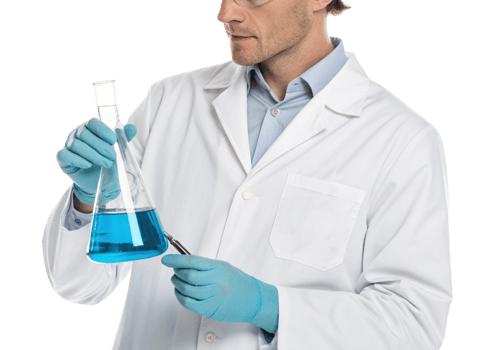 Scientist in lab coat examining blue liquid in flask, showcasing biotechnology and research innovation with focused expression png