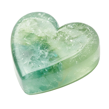 Heart-shaped soap bar are clear and crystal-like, with shades of green, isolated on a Transparent Background png