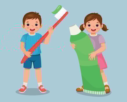 Little kids boy and girl holding big toothbrush and toothpaste vector