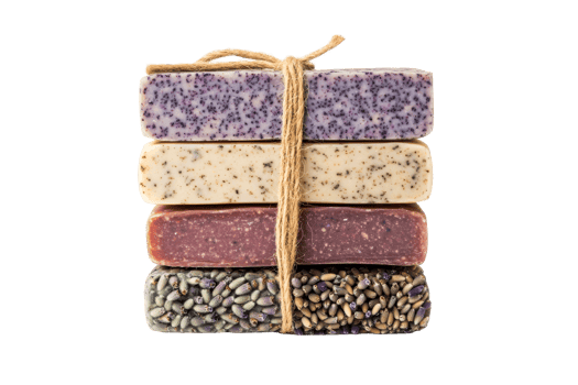 Stack of handmade soap bars tied with twine, cut out transparent png