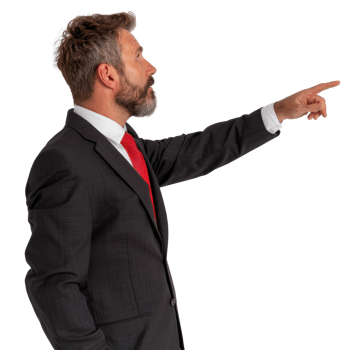 Businessman in Suit Pointing to the Side with a Focused Expression in a Studio Setting png