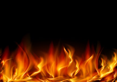 high quality image of realistic fire flames rising from the bottom against a dark background vector