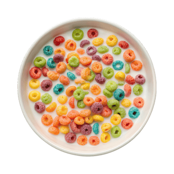 Colorful cereal in milk creates vibrant breakfast scene, evoking joy and nostalgia png