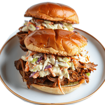 Delicious Pulled Pork Sandwiches with Tangy Coleslaw on a White Plate png
