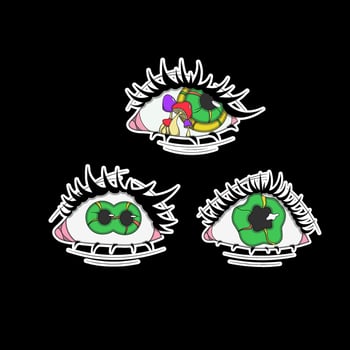 A set of three psychedelic stickers with green eyes vector