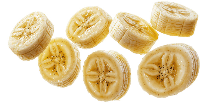 banana slices floating on white background png