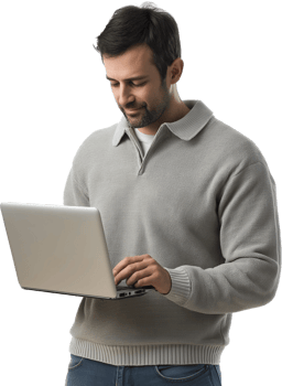 A man in a sweater is using a laptop png