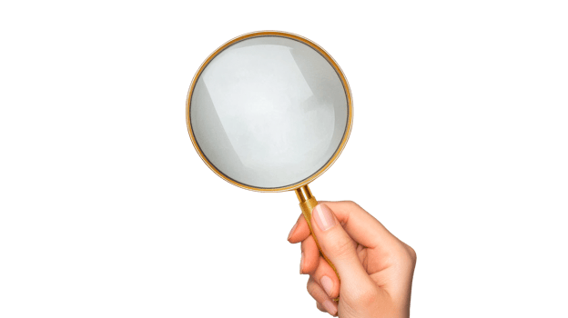 Hand holding a magnifying glass with a transparent background png