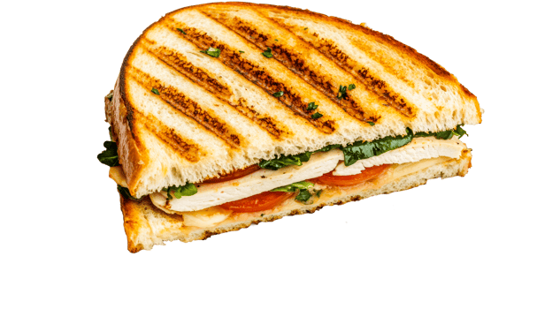 Grilled chicken sandwich with tomato and greens, cut out transparent png