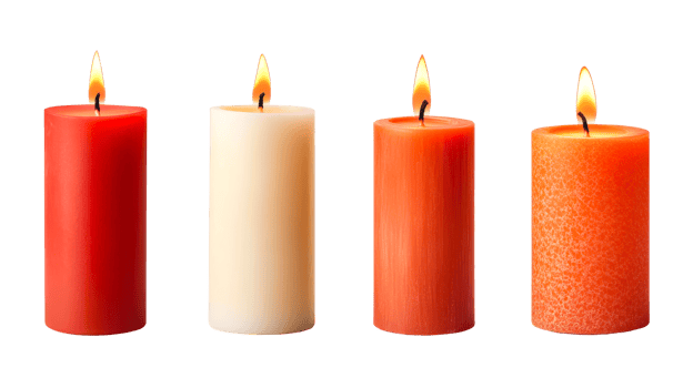 Burning colorful wax candles, flames illuminate black background, cut out transparent png