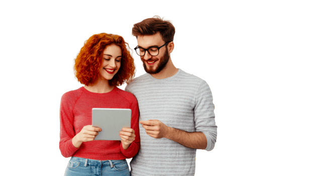 Young couple smiling while using tablet together png