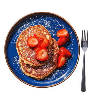 Delicious Buttermilk Pancakes with Fresh Strawberries and Powdered Sugar png