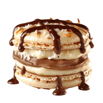 Delicious Layered Dessert with Cream Filling, Chocolate Sauce, and Coconut Flakes png