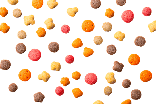 Assorted colorful dry pet food pattern on black background, cut out transparent png