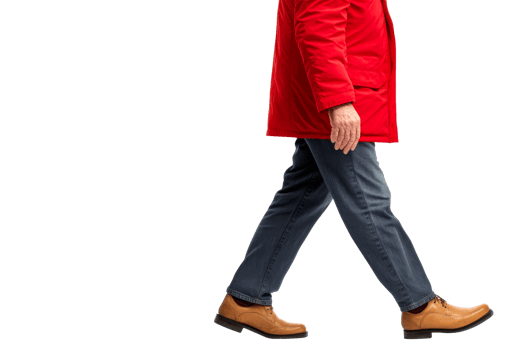 Walking older person in coat and jeans, cut out transparent png