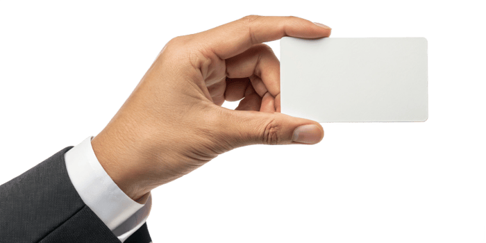 A hand in a business suit holds a blank white card for mockup png