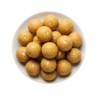 A top view of a plate filled with laddu sweets garnished with almonds on a plain white surface transparent background png