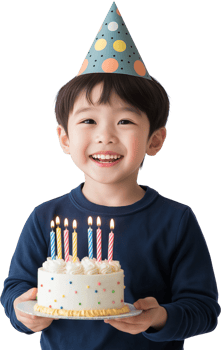 A boy holding a birthday cake with candles png